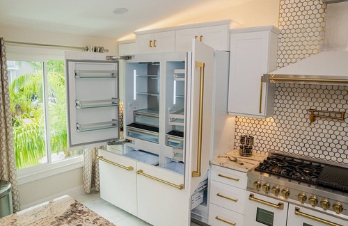 Indian Rocks Beach House | Waterfront Oasis, Heated Pool, Dock, Golf Cart & Chef’s Kitchen