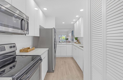 Boca Raton Apartment | Waterfront Oasis 2BR/2BA with Pool, Gym, Balcony & Parking