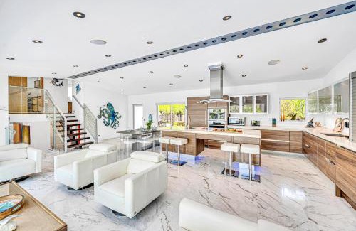 Riverside Park House | Waterfront Oasis Cascading Pool Views Centrally located Heated Pool Cascade KeyResidences