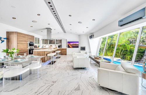 Riverside Park House | Waterfront Oasis Cascading Pool Views Centrally located Heated Pool Cascade KeyResidences