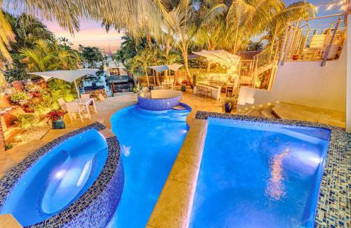 Riverside Park House | Waterfront Oasis Cascading Pool Views Centrally located Heated Pool Cascade KeyResidences