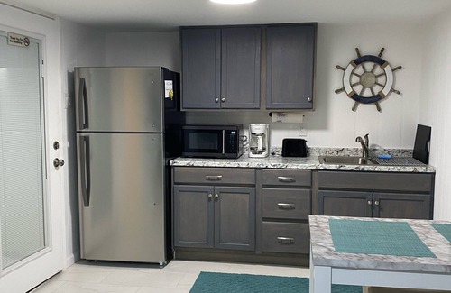 Dickinson House | Waterfront Oasis with private pool, Hot tub and 200 ft. Lighted fishing pier