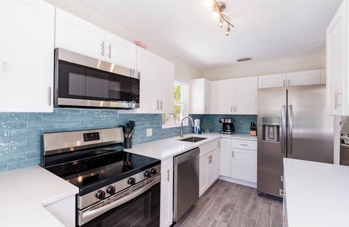 Bradenton Beach House | Waterfront paradise, walking distance to beach! Private heated pool!
