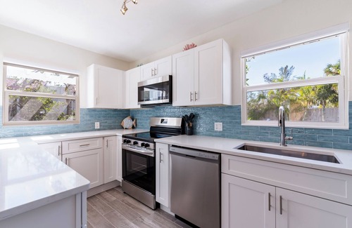 Bradenton Beach House | Waterfront paradise, walking distance to beach! Private heated pool!