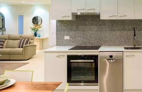 Glenelg North Apartment | Waterfront Paradise heated swim spa