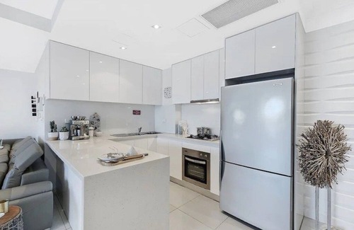 The Entrance Apartment | Waterfront Penthouse with heated jacuzzi and private rooftop terrace