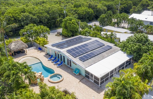 Marathon House | Waterfront & Privacy, Heated Pool HotTub & waterfall, 60' Dock TikiHut, pets ok