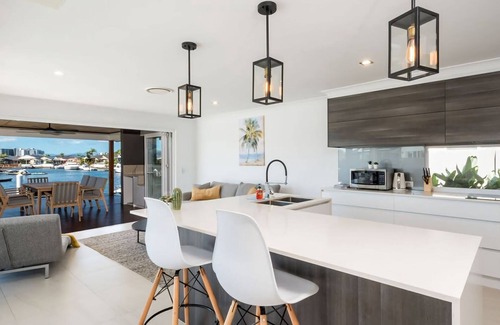 Runaway Bay House | Waterfront Resort Style Retreat Runaway Bay