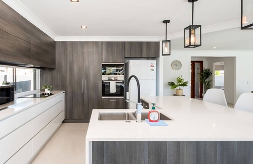 Runaway Bay House | Waterfront Resort Style Retreat Runaway Bay