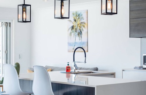 Runaway Bay House | Waterfront Resort Style Retreat Runaway Bay