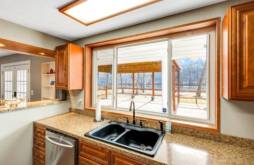 Rockaway Beach House | Waterfront Retreat at Rockaway with Fishing Dock by RedAwning