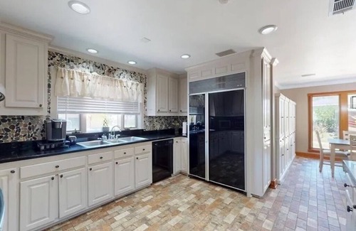 Springfield House | Waterfront Retreat with Pool, Hot Tub & Boat Access on the Tickfaw River