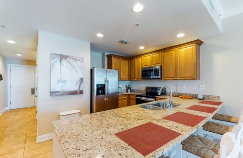 Upper Grand Lagoon Condo | Waterfront Snowbird retreat with private balcony & pool - near the beach