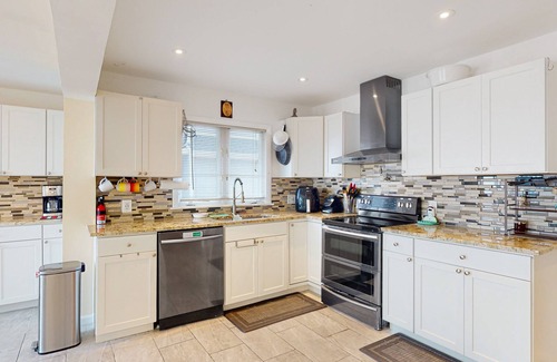 Midtown Ocean City House | Waterfront townhouse with bay views, pool, tennis, deck, grill, streaming, W/D