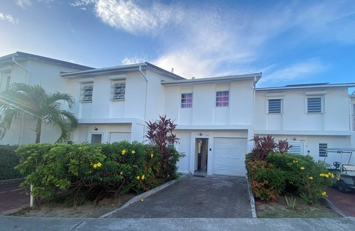Jolly Harbour Villa | Waterfront two bed villa 3 mins walk to stunning Beach, air con and balcony