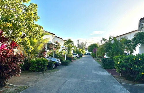 Jolly Harbour Villa | Waterfront two bed villa 3 mins walk to stunning Beach, air con and balcony