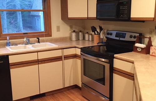 Sunapee House | Waterfront Vacation Home For Up To 5 Guests. Canoe, Swim, Ski, and Have Fun.