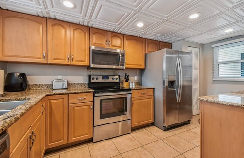 Indian Shores Condo | Waterfront views - steps from the Beach!