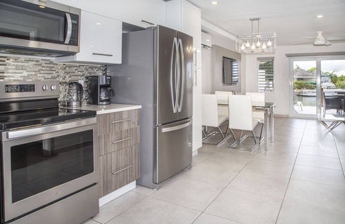 Jolly Harbour Ski Chalet | Waterfront Villa 246D South Finger