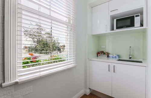 Millers Point House | Waterview terrace in rock