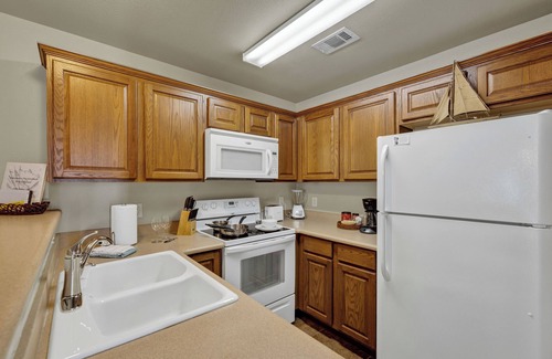 New Braunfels Condo | Waterwheel on the Guadalupe - river access, 2 pools, 4 hot tubs, 5 acres of lawn