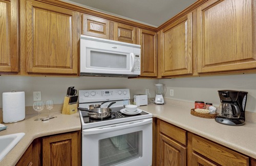 New Braunfels Condo | Waterwheel on the Guadalupe - river access, 2 pools, 4 hot tubs, 5 acres of lawn
