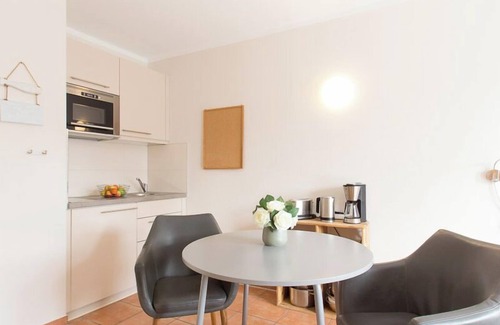 Warnemuende Apartment | Wave play, modern one-room apartment, quiet location, perfect for. 2 pers. - Atelier on the river