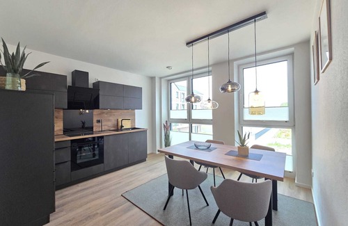 Suderneuland I Apartment | Weiße Düne - stylish living comfort with sauna & balcony at the Norder Marina