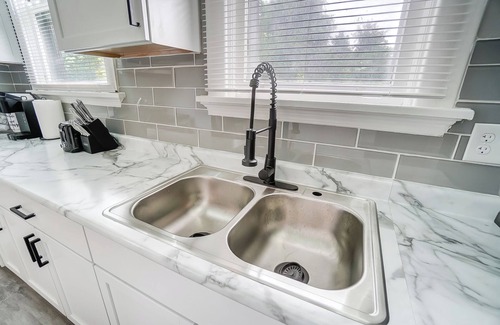 Roselawn Finance House | Welcome Home to this stylish entrainment home! Have fun with the whole family.