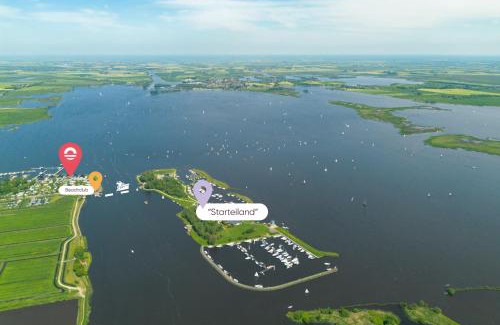 Offingawier Apartment | Welcome in - Houseboat Earrebarre aan het Sneekermeer met dakterras, prachtig uitzicht