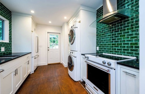 Benton Harbor Apartment | Welcome to a one-of-a-kind getaway in this modern and thoughtfully designed container home. Nestled in a quiet, wooded lot within Benton Harbor, the home offers a peaceful retreat just minutes from the beaches of Lake Michigan and charming shops
