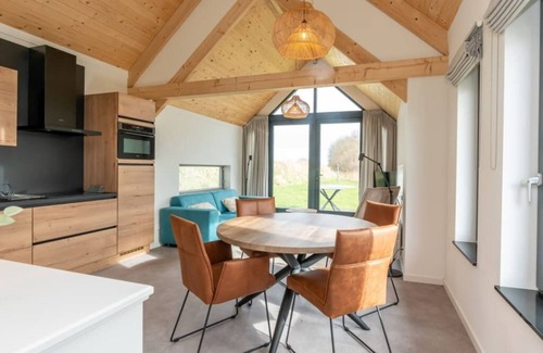 Westenschouwen House | Welcome to Chalet 7 at Riethoek Westerschouwen, where peace, comfort and nature come together. Step