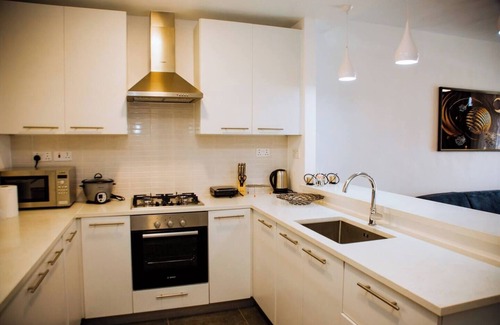 Patang West House | Welcome to our luxury gated townhome in Oyarifa Park, a serene enclave in Accra.