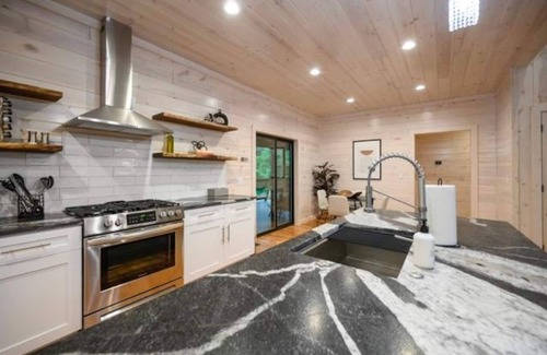 Pickens Cabin | Welcome to Simi Lodge nestled in a tranquil and picturesque location. Offering a perfect escape from the everyday hustle and bustle. It promises a secluded retreat immersed in the dreamy forest ambiance, close to Broken Bow and Hochatown.