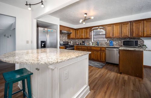 Norman House | Welcome to your backyard Oasis, right next to OU. Boomer Sooner!