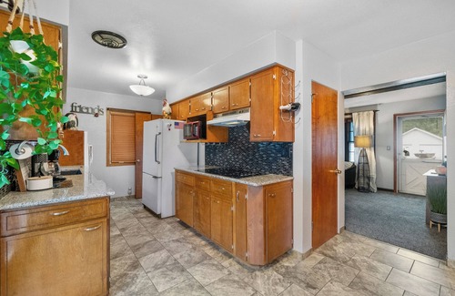 Waterloo House | Welcoming 2-bedroom home with large deck and central location.