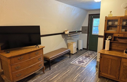 Coram Cabin | Welcoming cabin with AC located in Coram ten minutes from Glacier National Park.