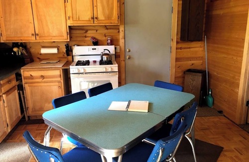 Skanee House | Welcoming off the Grid 2-bedroom Cabin in Skanee. On the Big Huron River.