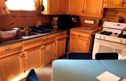 Skanee House | Welcoming off the Grid 2-bedroom Cabin in Skanee. On the Big Huron River.