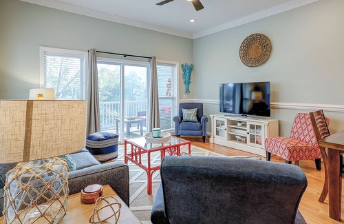 Waters Edge House | Welcoming water view townhome with pool, balcony, deck, & kitchen