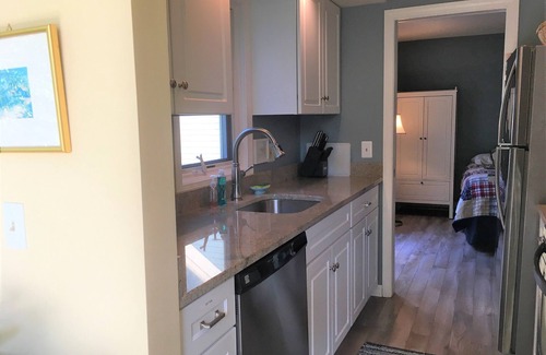 Brewster Condo | Well decorated luxury garden apartment with 3 private decks and spectacular golf course views!