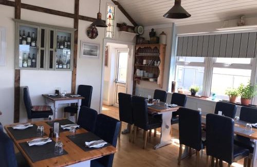 Fenit House | Westend Bar & select accommodation