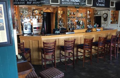 Fenit House | Westend Bar & select accommodation