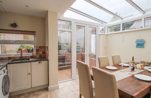 Weymouth Cottage | WEYBURY COTTAGE, pet friendly, with a garden in Brewers Quay Harbour