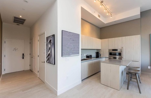 Hollywood South Central Beach Apartment | Where bay views meet boutique style: luxurious 1-bedroom retreat with modern flair and coastal charm