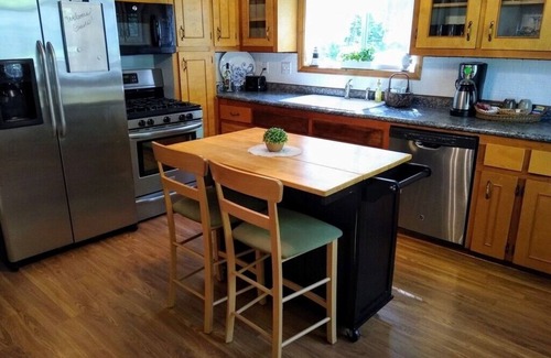 Caseville Cottage | ‘Whispering Oaks’ Cottage with Private Lake Access, Outdoor Fire Pit and More!