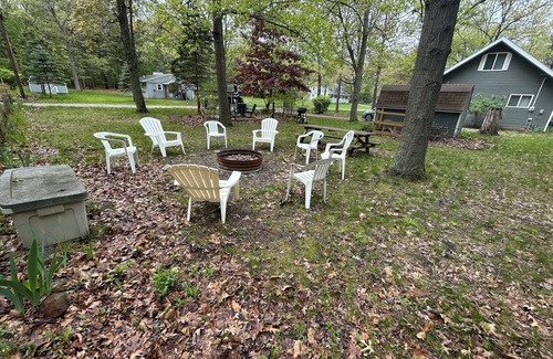 Caseville Cottage | ‘Whispering Oaks’ Cottage with Private Lake Access, Outdoor Fire Pit and More!