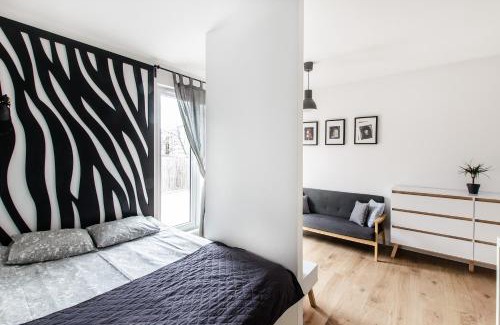 Krzyki Apartment | White Apartment With Terrace