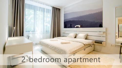 Old Town Apartment | White Apartments with AC by Kovee