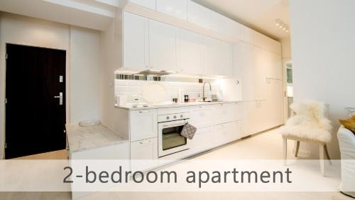 Old Town Apartment | White Apartments with AC by Kovee